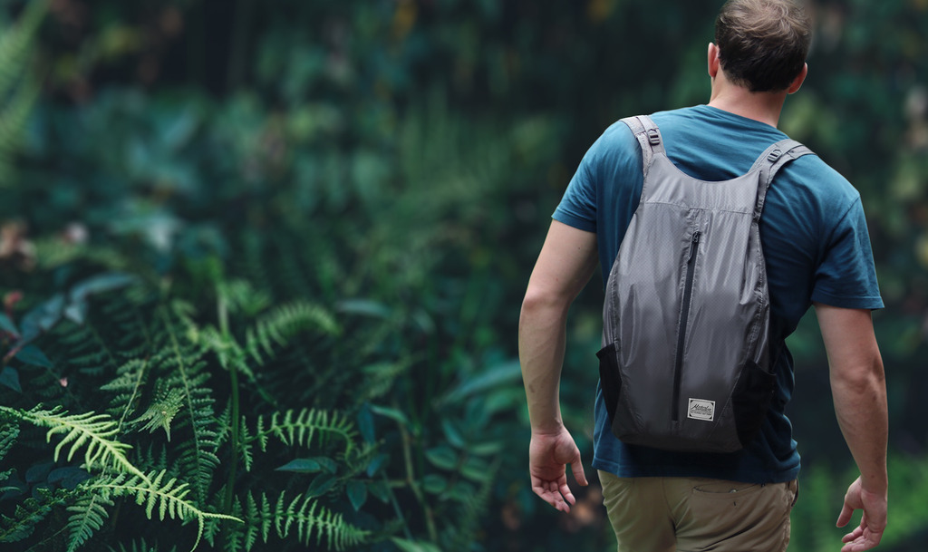 how to pack for hiking like a minimalist: pack everything into a waterproof matador freerain24 backpack