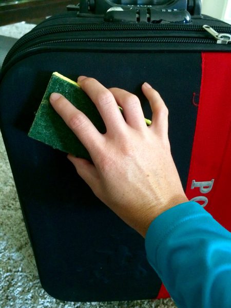inspect and clean luggage with a damp cloth for the interior, and warm water and a sponge for the exterior