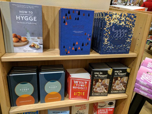 hygge books in a bookcase at waterstones picadilly in london 