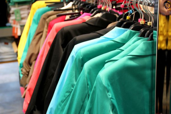 womens blazers hanging on a clothes rack