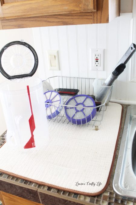 laura’s crafty life says to air dry your vacuum cleaner attachments after washing them with warm water and dish soap