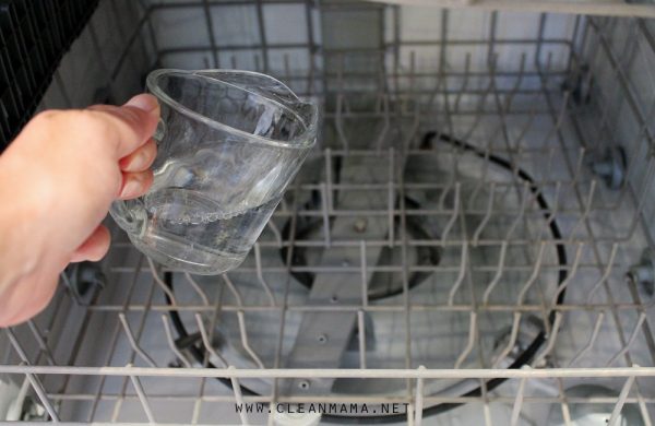 how to clean dishwasher with vinegar: fill a mug with vinegar, put it in the top rack, and run a normal cycle