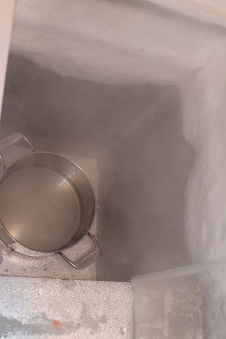 how to defrost a freezer with hot water in a pot
