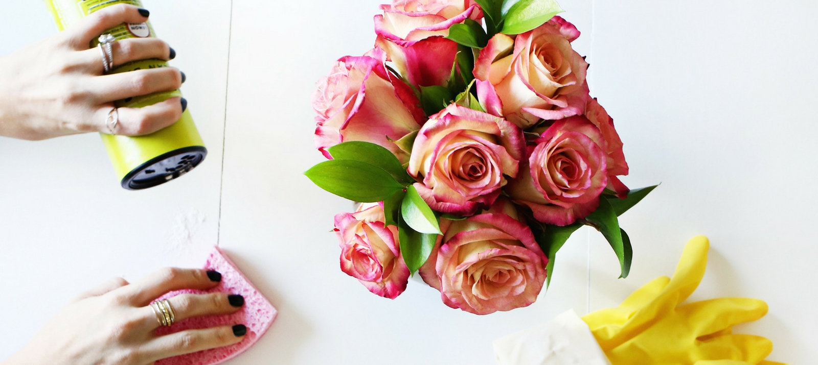 5 stages of spring cleaning with white powder, a pink sponge, yellow rubber gloves, and pink and yellow roses from a beautiful mess