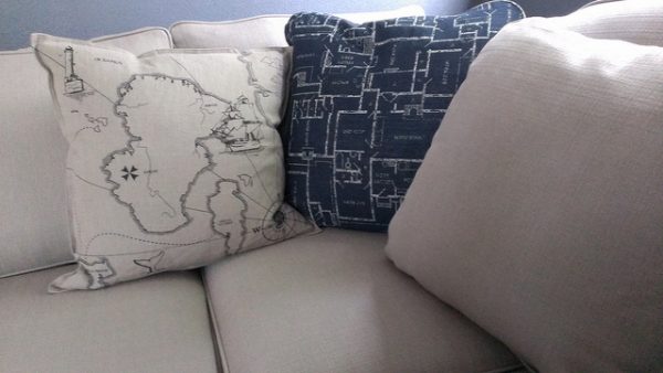 homespot hq decorative pillows on a clean sofa