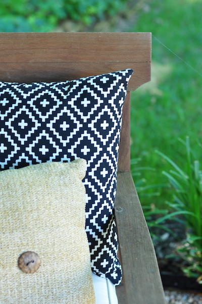 2 outdoor pillows on a fire pit chair designed by alison giese