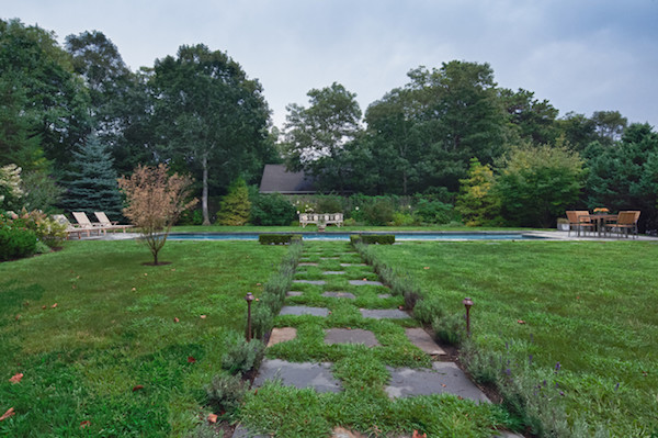 backyard stone walkway and pool by renae cohen