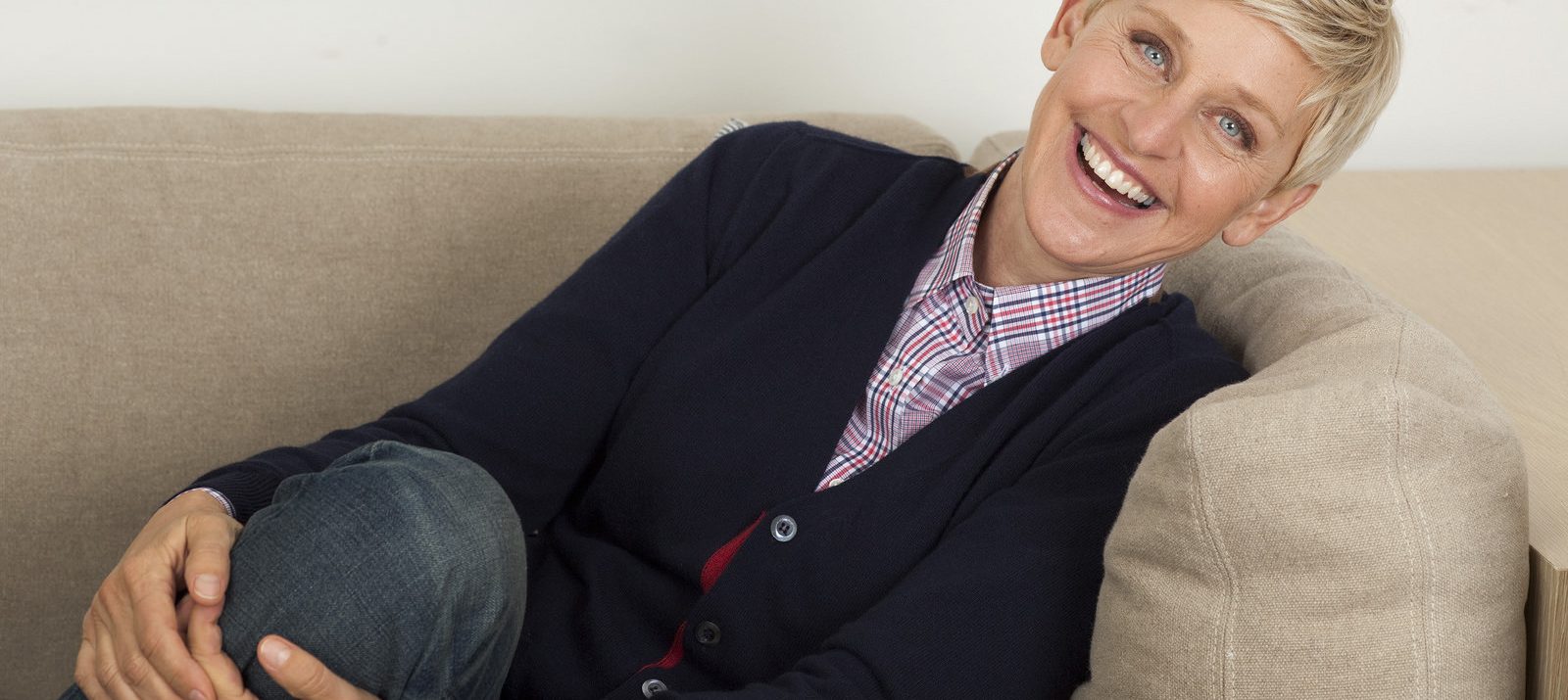 ellen degeneres sitting on a couch