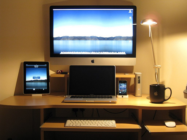 A collection of Apple products on a desk
