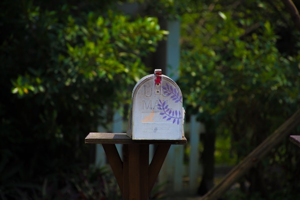 a closeup of a mailbox outside