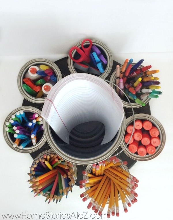 a collection of school supplies made accessible with a lazy susan organizer