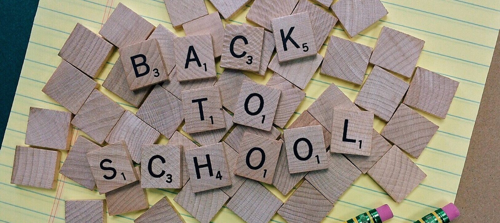 back to school organization tips and ideas scrabble tiles and 2 pencils atop a notepad