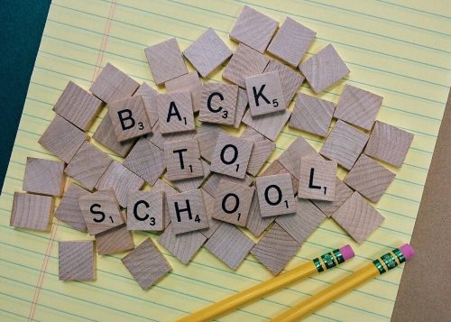 back to school organization tips and ideas scrabble tiles and 2 pencils atop a notepad