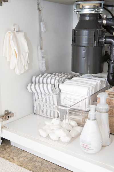 a closeup of under-the-sink organization