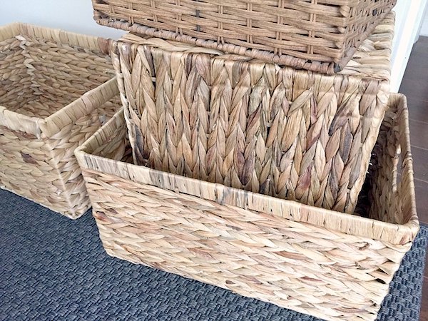 four wicker baskets for in-home storage