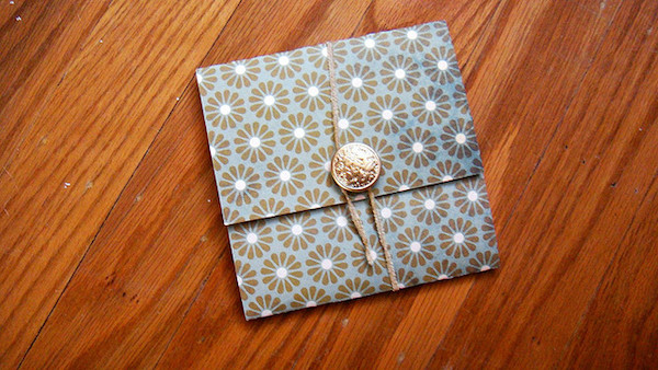 A small, closed envelope resting on a table