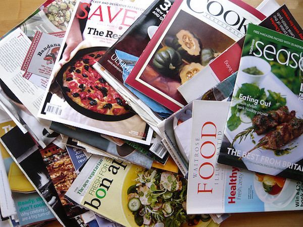 A sizable pile of old magazines like Food and Bon apetit 