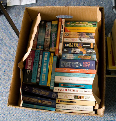 A box full of books ready to be donated