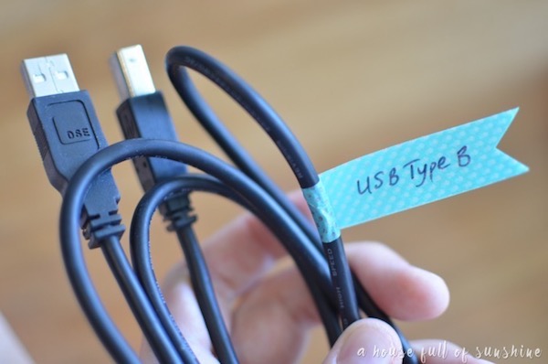 a usb cord organized with a DIY washi tape label