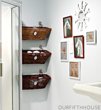 3 hanging wicker window box baskets storing towels and toiletries