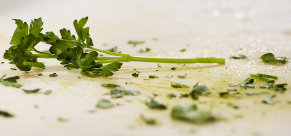 chopping home grown parsley for cooking