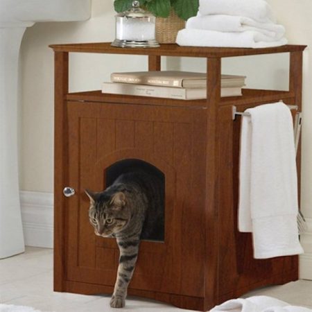 a merry products hidden cat litter box enclosure that doubles as a shelf