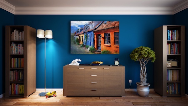 organized minimalist room with blue walls