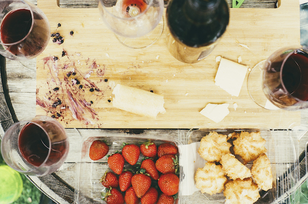 a cutting board with leftover food