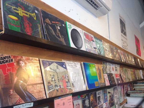 a line of records for sale at Academy