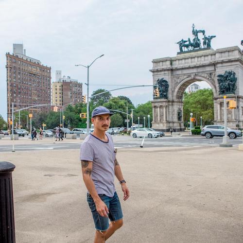 michael from coolcousin in front of grand army plaza in brooklyn