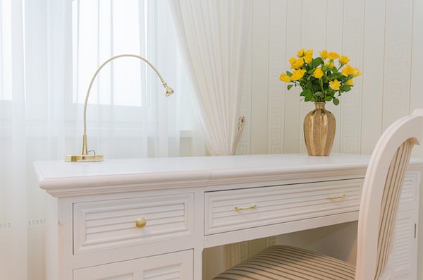 natural light sheer curtains over desk