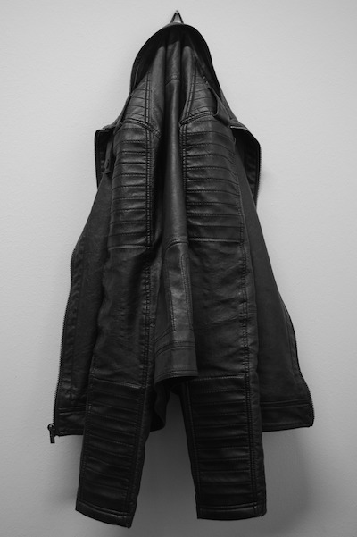 hanging black leather jacket