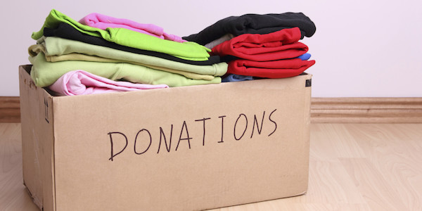 clothing donation in a cardboard box