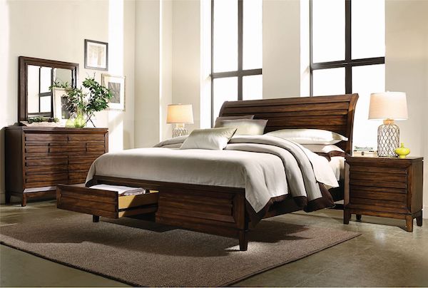 dark wood bed with footboard storage