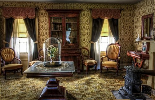 living room with vintage fragile wood furniture