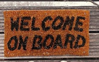 a floor mat that reads welcome on board