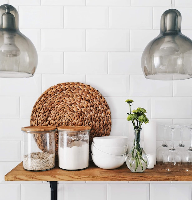 a kitchen shelf lined with ingredients 