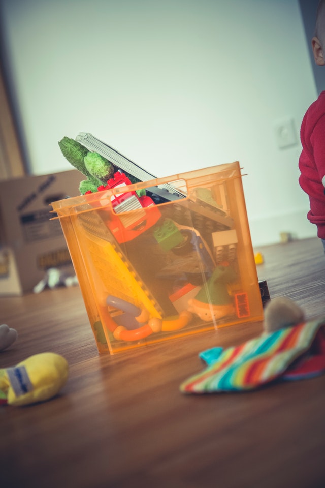 A storage bin filled with toys