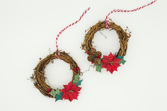 Holiday wreaths agaist a white background 