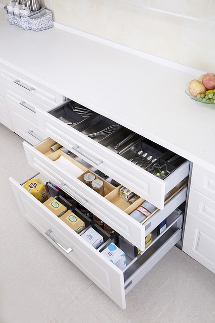 Kitchen drawers filled with separators and neatly arranged utensils