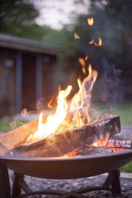 A small campfire in the backyard