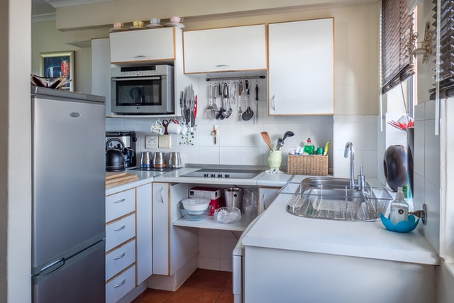 A bunch of cabinets with a corner pocket