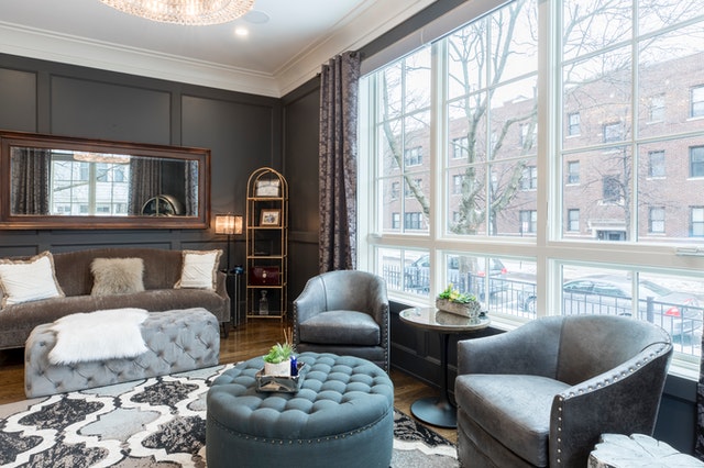 A living room with clean french windows