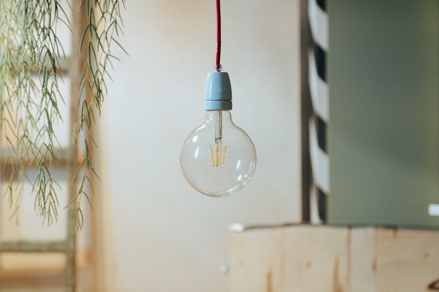 A bulb descended from the ceiling.