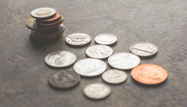 Pennies against a concrete background