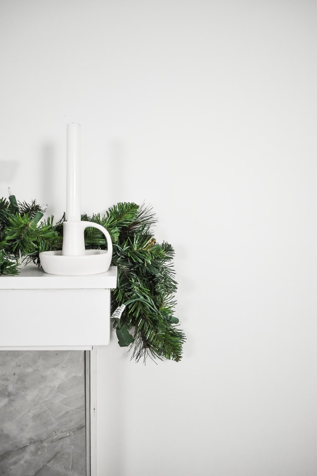 A decked out mantel green pines