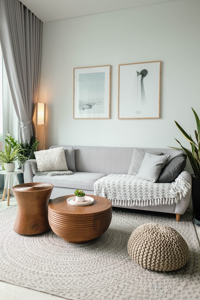 A floor lamp in a well-lit living room