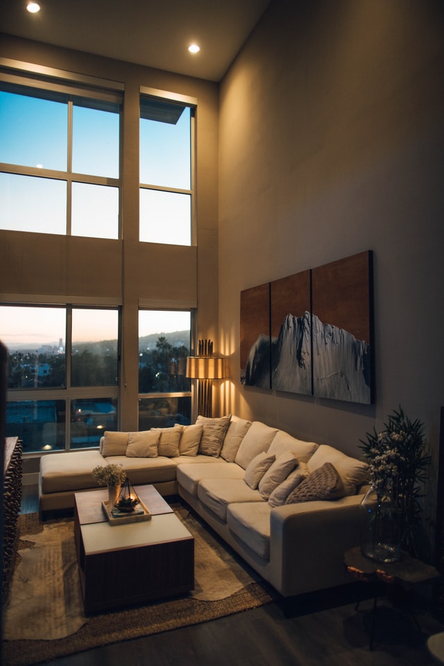 Recessed lighting in a high-ceiling living space 