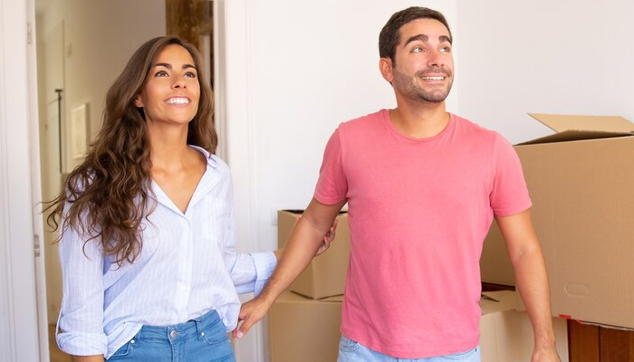 couple looking up their new apartment