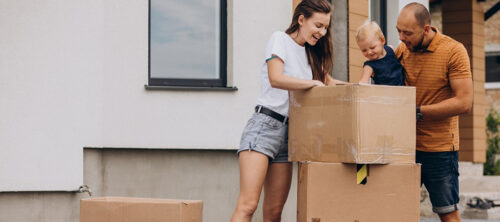 family packing items for summer moving